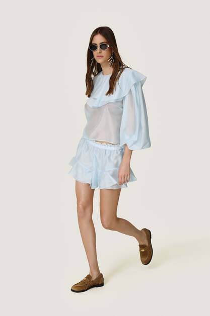 Airy baby blue chiffon blouse with oversized ruffle details - SS26